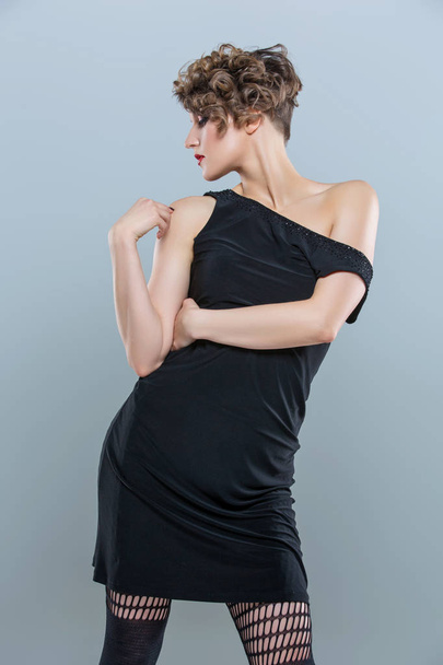 woman in small black dress - Photo, image