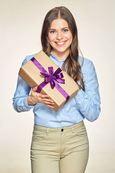 happy young woman holding gift box.  - Фото, зображення