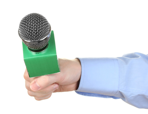 Male hand with microphone isolated on white - Fotoğraf, Görsel