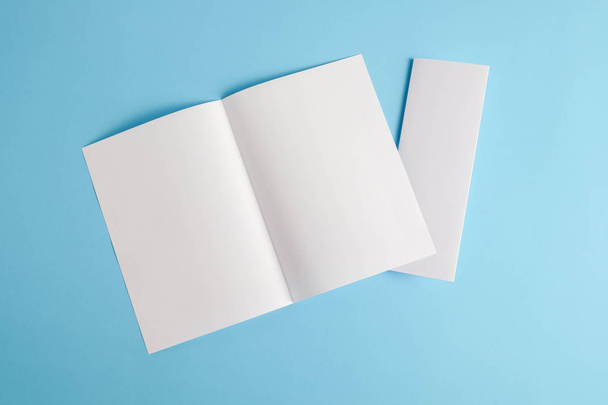 template fold white paper on blue background - Fotoğraf, Görsel