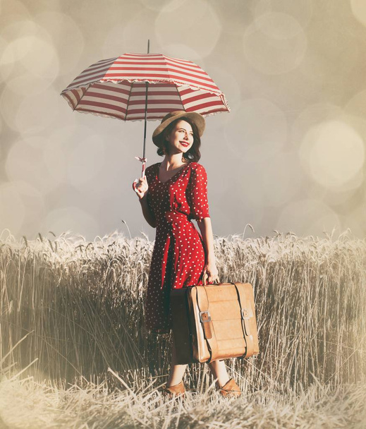 Young woman with umbrella - Photo, Image