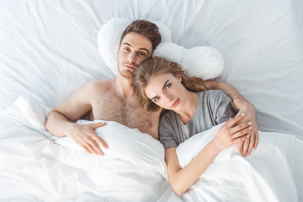 couple in bed at morning - Zdjęcie, obraz