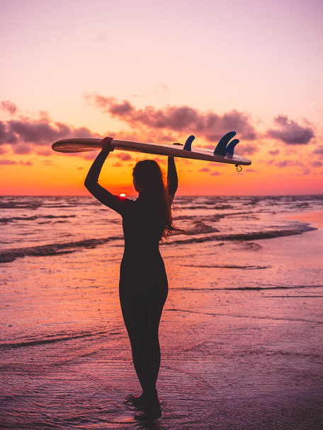  woman  with surf board  - Photo, Image