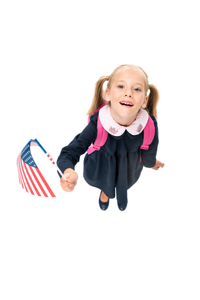 μικρή μαθήτρια με σημαία των ΗΠΑ - Φωτογραφία, εικόνα