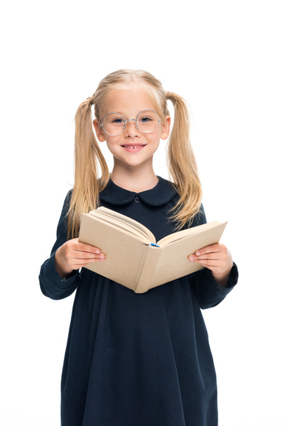 smiling schoolgirl with book - 写真・画像