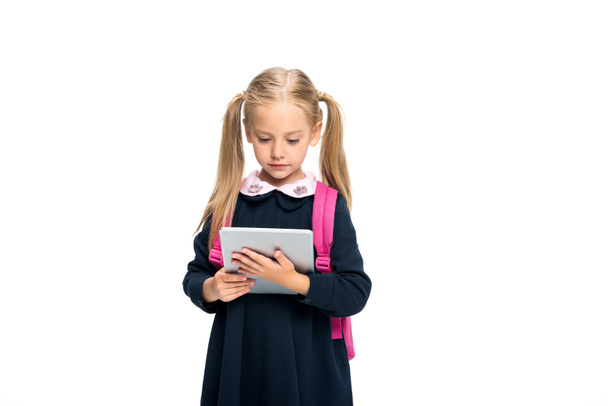 schoolgirl using digital tablet - Φωτογραφία, εικόνα