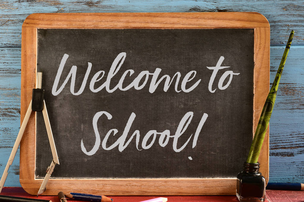 text welcome to school written in a chalkboard - Photo, Image