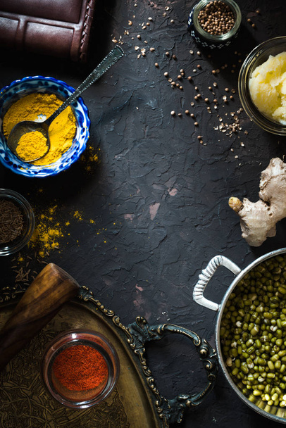 Concept of Indian cuisine with mung dal on the dark background - Zdjęcie, obraz