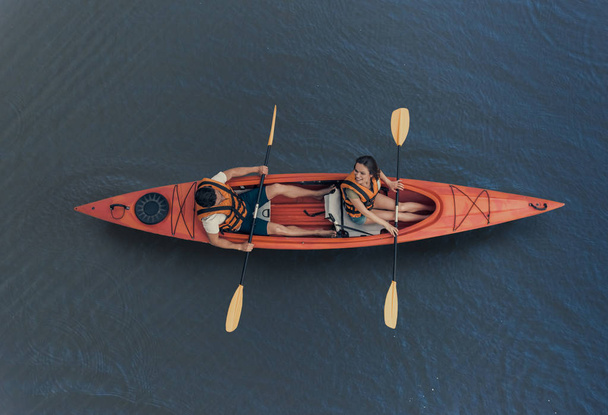 Couple travelling by kayak - 写真・画像