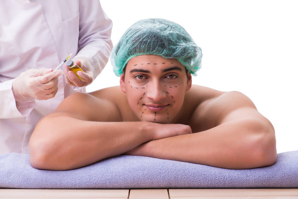 Handsome man in spa massage concept - Photo, image