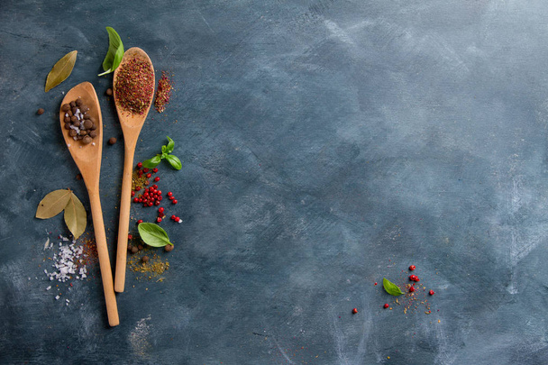Wooden spoons with spices  - Photo, Image