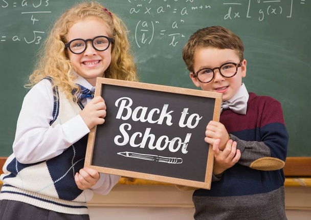 blackboard with two school kids - Zdjęcie, obraz
