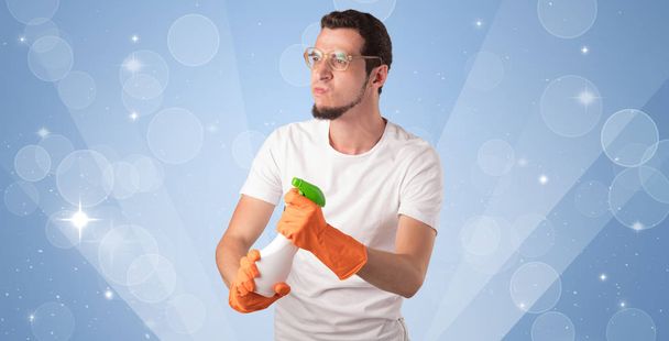 Glittered background with male housekeeper - Foto, afbeelding