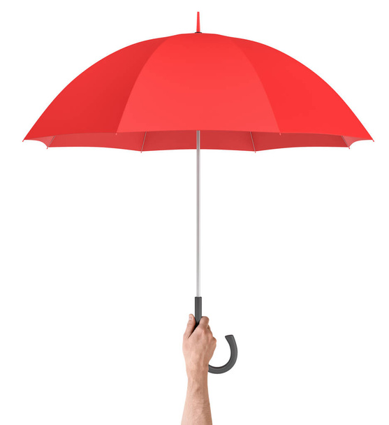 A male hand holds a large classic red umbrella with an open canopy and a black curved handle. - Fotoğraf, Görsel