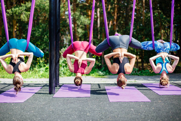 Exercise in the open air. Aerial yoga. - Fotografie, Obrázek