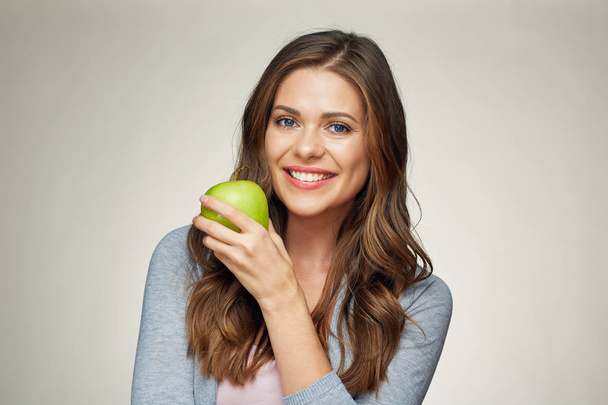 smiling woman with green apple - Photo, Image