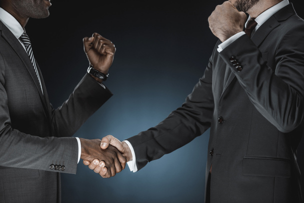 multicultural businessmen handshake - Foto, Bild