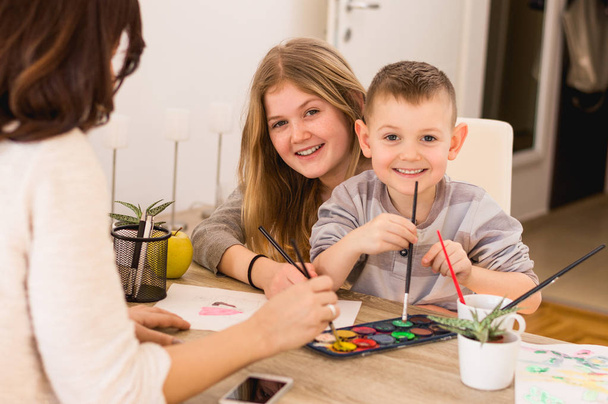 Happy family painting at home - Foto, Imagen