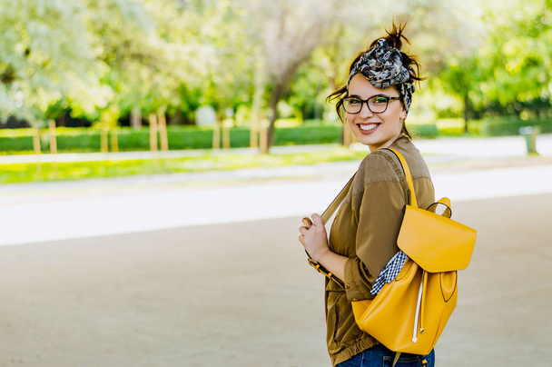 stylish girl with yellow backpack    - Photo, Image