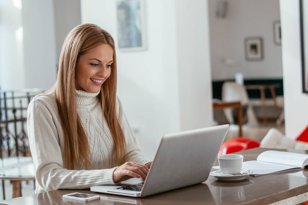Business woman working on laptop  - Фото, изображение