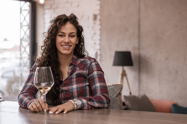 Woman with glass of white wine  - Zdjęcie, obraz