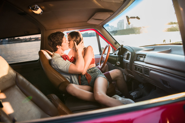 couple kissing in car - Photo, Image