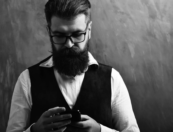 Bearded man, brutal caucasian hipster with moustache in glasses - Photo, image