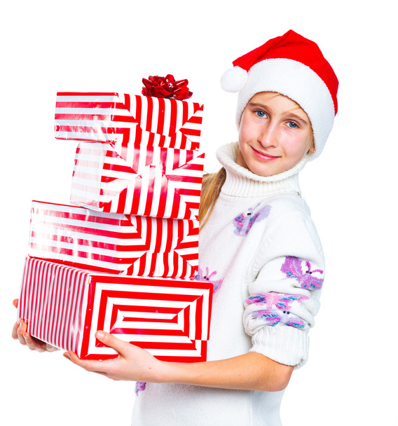 Menina bonito no chapéu do Papai Noel com caixa de presente
 - Foto, Imagem