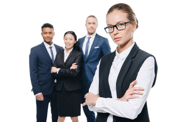 confident businesswoman with colleagues - Photo, Image