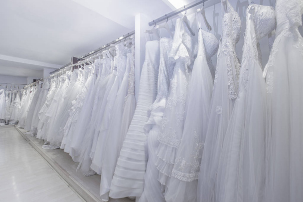 Many bridal gowns are waiting to be used  - Photo, Image