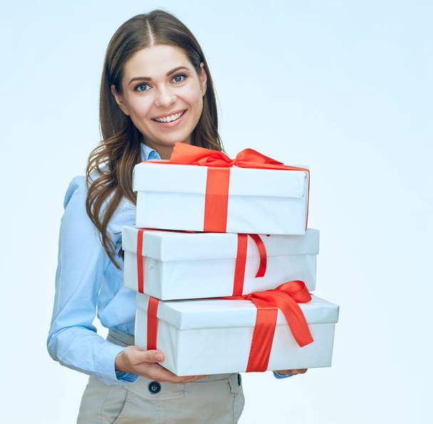 Smiling business woman holding gift box.  - Zdjęcie, obraz