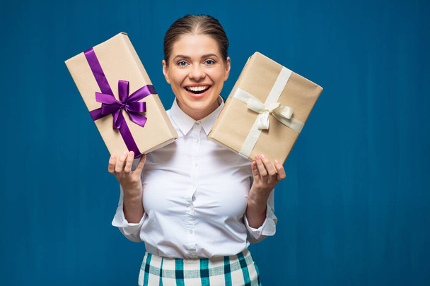 Happy woman holding gift boxes - Foto, Bild