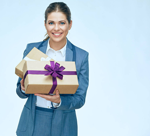 woman in business suit holding boxes  - Photo, Image