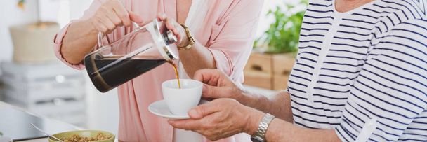 Pouring husband coffee - Foto, imagen