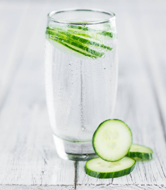 Cucumber Water on a vintage background - 写真・画像