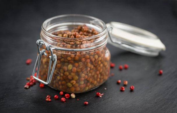 Some preserved Pink Peppercorns - Photo, Image