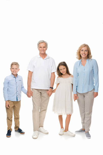 бабушки и дедушки и дети держатся за руки
 - Фото, изображение