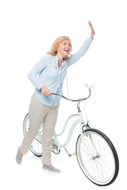 Mulher madura com bicicleta
 - Foto, Imagem