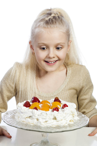 Girl eats a cake - Фото, зображення
