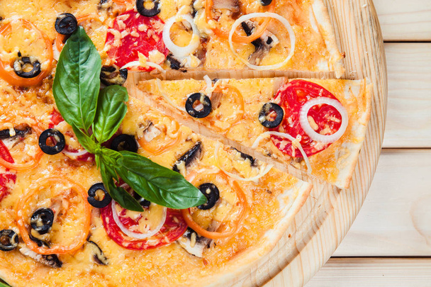 Assorted Pizza on the wooden background - Photo, image