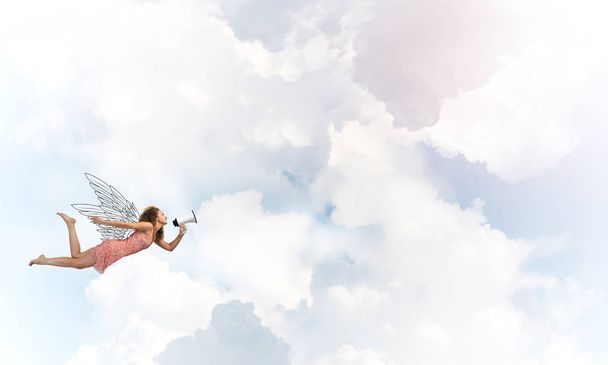 woman with megaphone flying  - Foto, Imagem