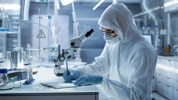 In a Secure High Level Research Laboratory Scientist Writing Dow - Photo, Image