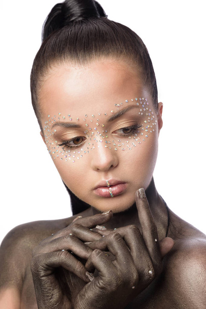 Brunette beautiful woman with crystals on face. - Photo, Image