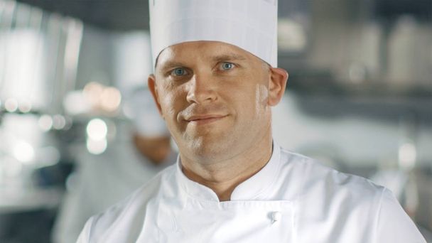 Close-up of a Famous Chef Smiling on Camera. - Foto, imagen