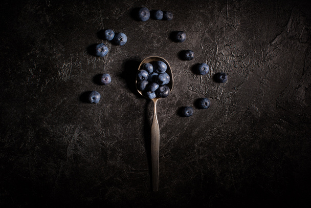 blueberries and vintage spoon - Fotografie, Obrázek
