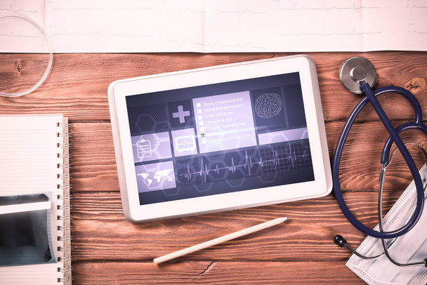 White tablet pc and doctor tools  - Foto, Imagen