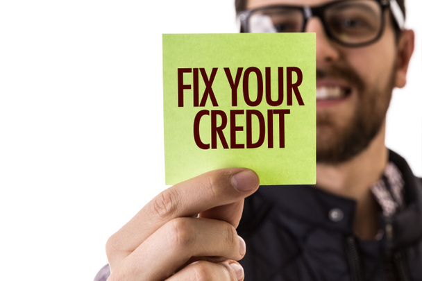 Fix Your Credit op de afbeelding van een concept - Foto, afbeelding