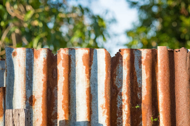 Old rusty corrugated tin zinc metal wall in vintage tone. - Valokuva, kuva