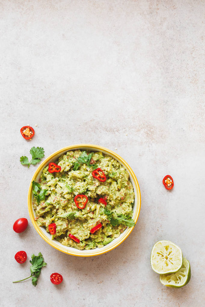 Bowl of guacamole dip  with ingredients - Foto, immagini