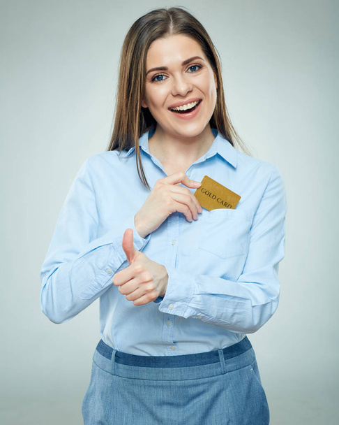 Happy woman holding credit card. Isolated  - Valokuva, kuva